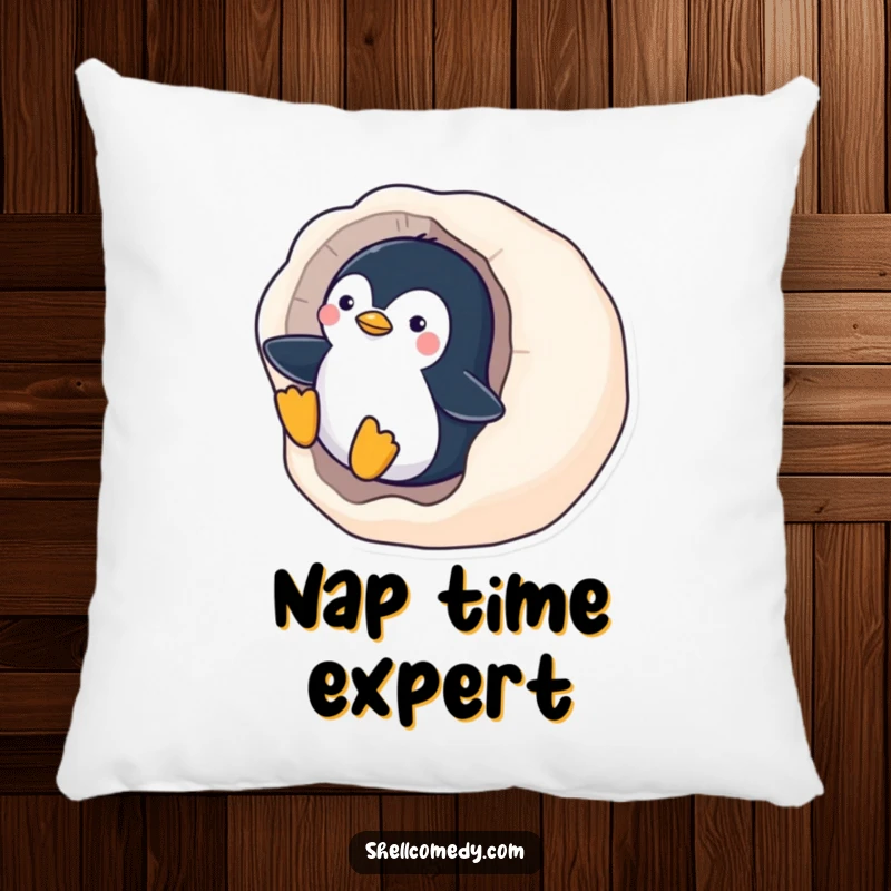 Funny Penguin Pillow: A playful penguin rests after sliding down a smooth, polished seashell, a cozy winter friend.