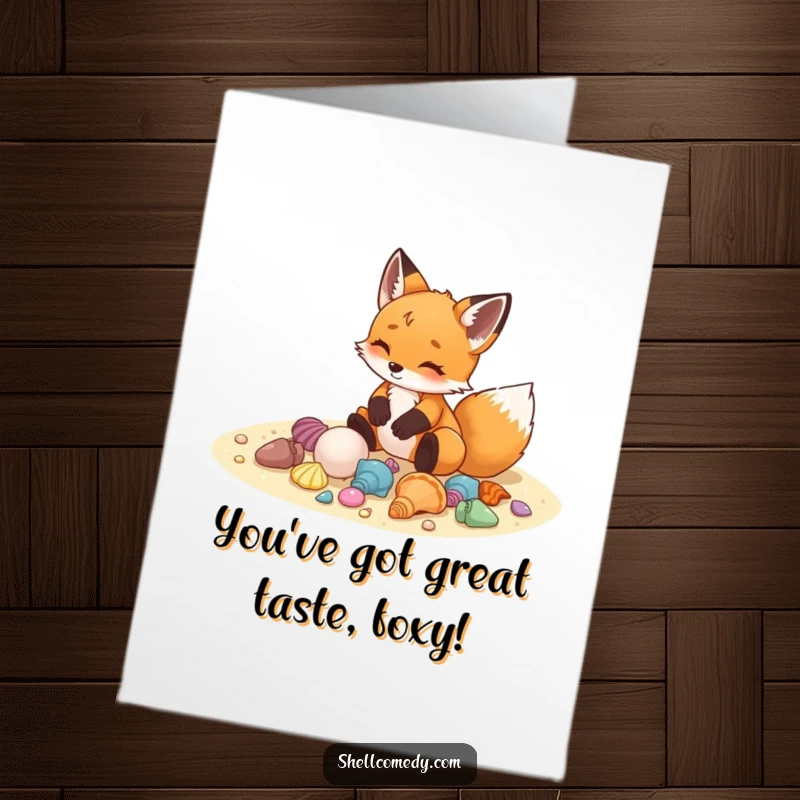 Free printable congratulations card where a delighted fox cub meticulously arranges colorful seashells on the sand, creating art.